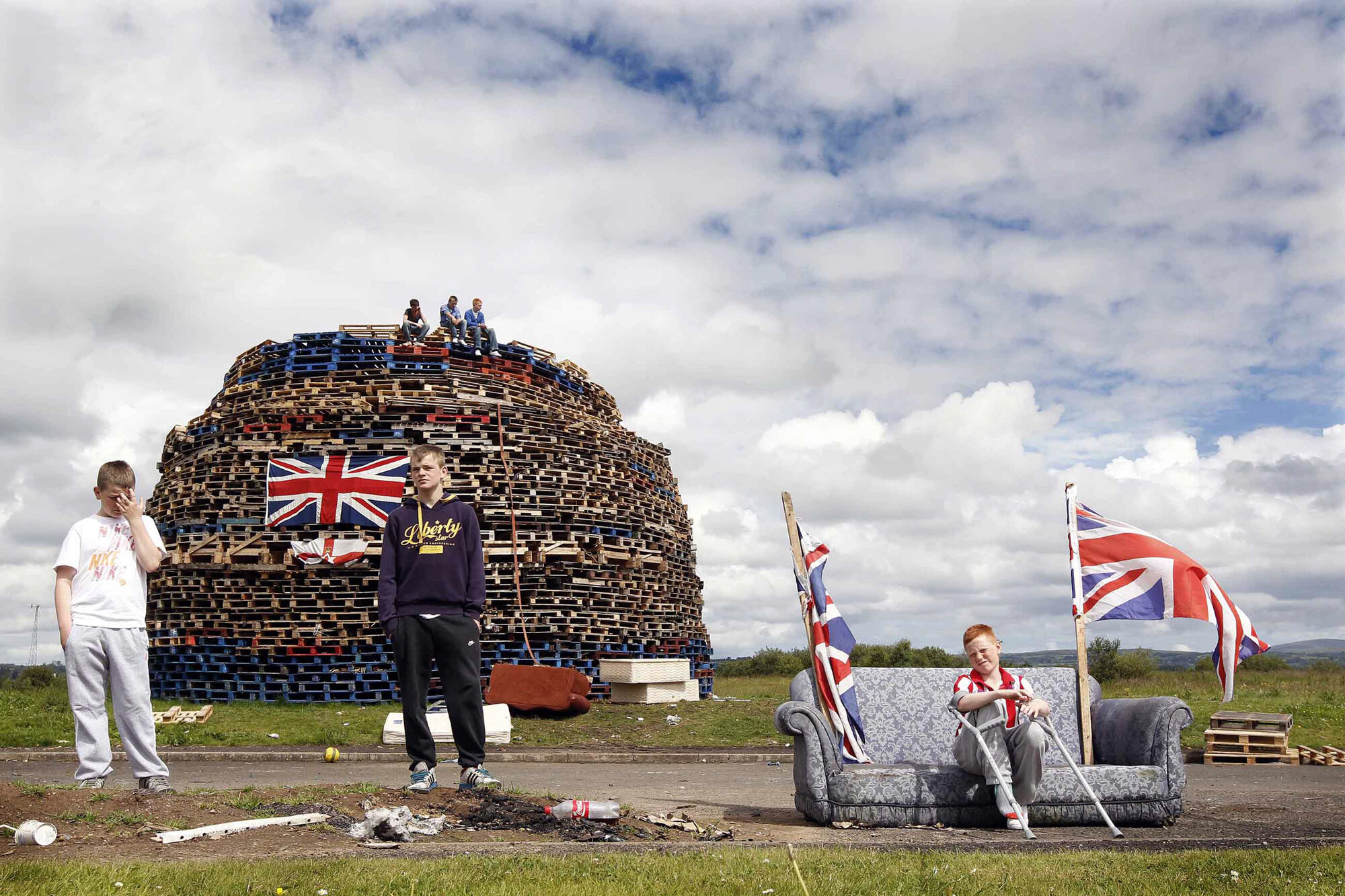 Protestant Youths guard a bonfire in Ballymena, 2010.