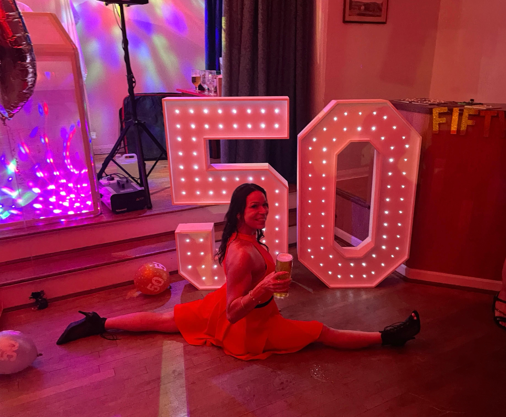joanna performing a split on her 50th birthday