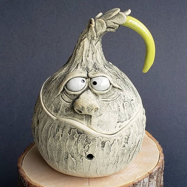 Time for another round of garlic pot making.  I am trying to load the shelves for markets that &quot;may&quot; be open this fall and winter.
.
.
.
Funny#garlic#cooking#giftsforher#giftsforhim#kitchendecor#unique#pottery#clay#characters#faces#funpotte