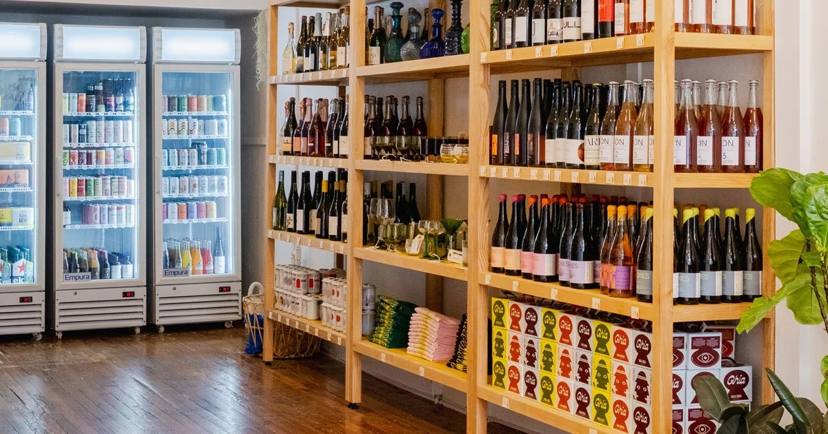 Interior of The Zero Co. with bottles on shelves.