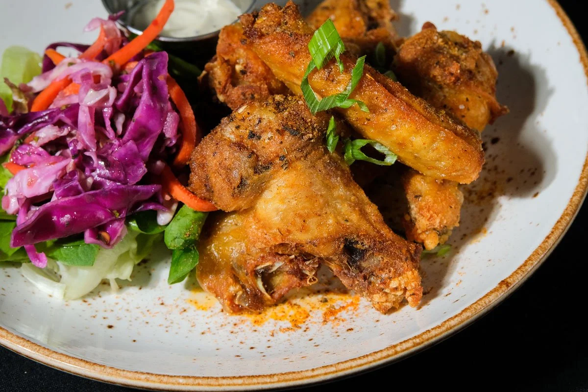 The Local Tavern Kicks off Bowl Season with Game-Day Specials