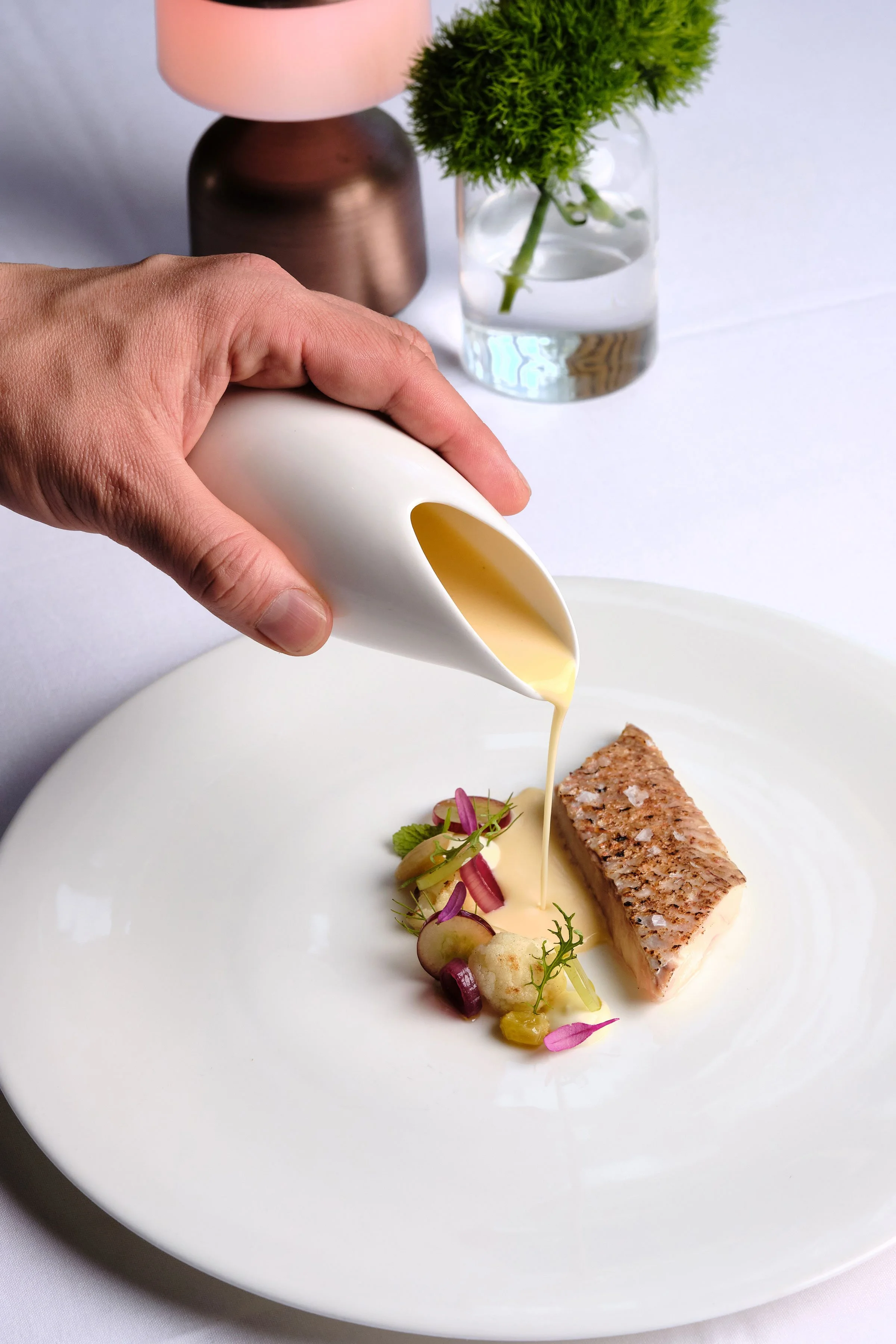 grilled-snapper,-cauliflower-soubise,-ver-jus-golden-raisins,-red-grapes,-champagne-beurre-blanc-1-web.jpg