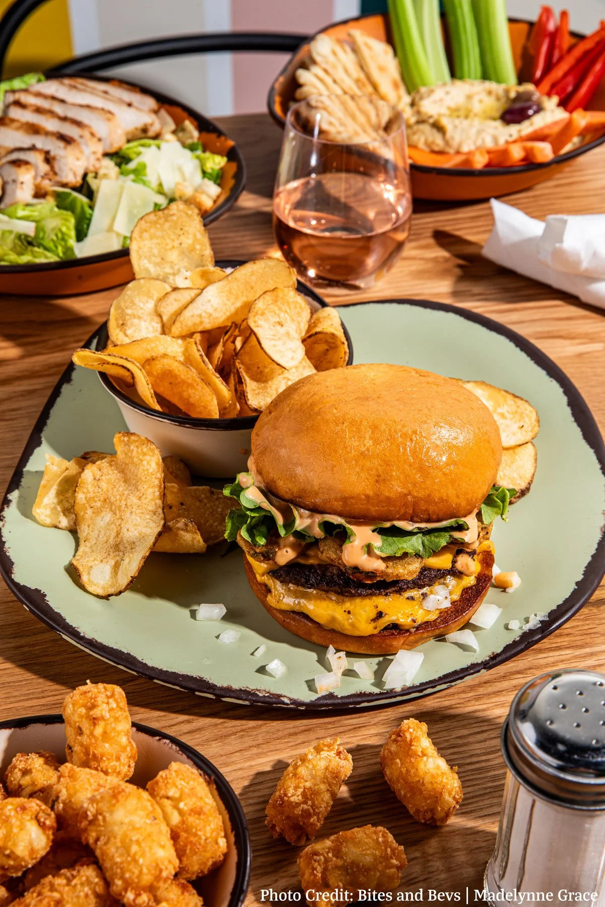 A full table of food from Off Leash