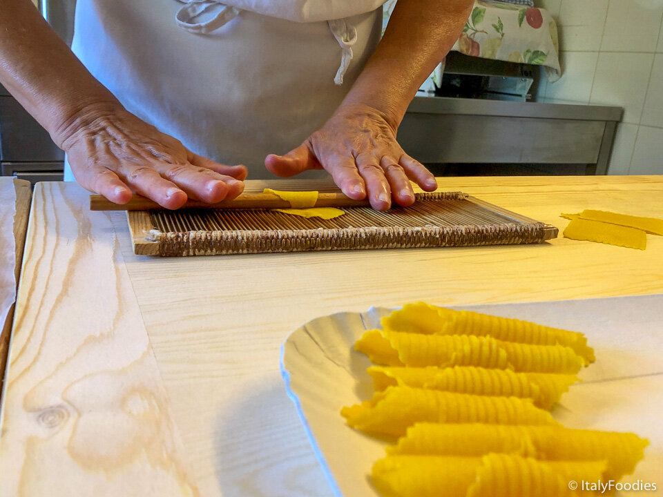 Rolling pasta on a Garganelli comb