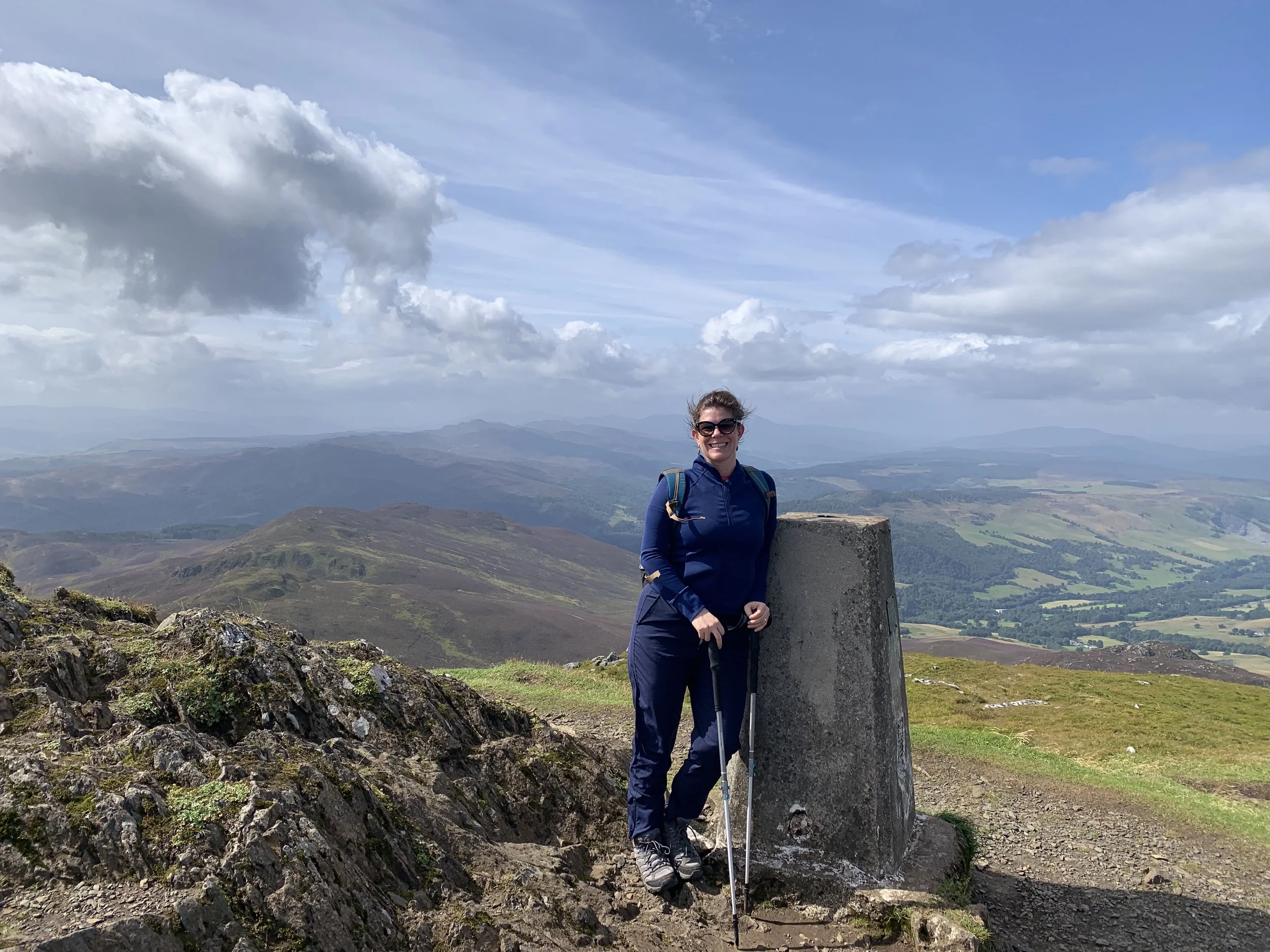 Solo woman hiking in Caringorms National Park Scotland