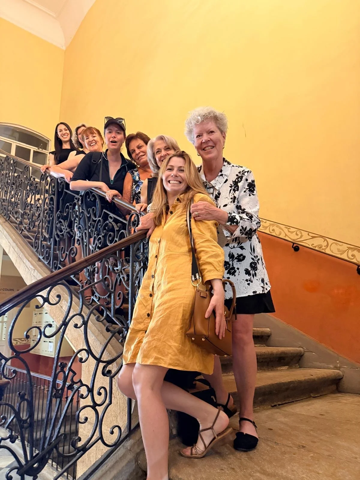 Bold Spirit travelers together on a staircase in Aix-en-Provence