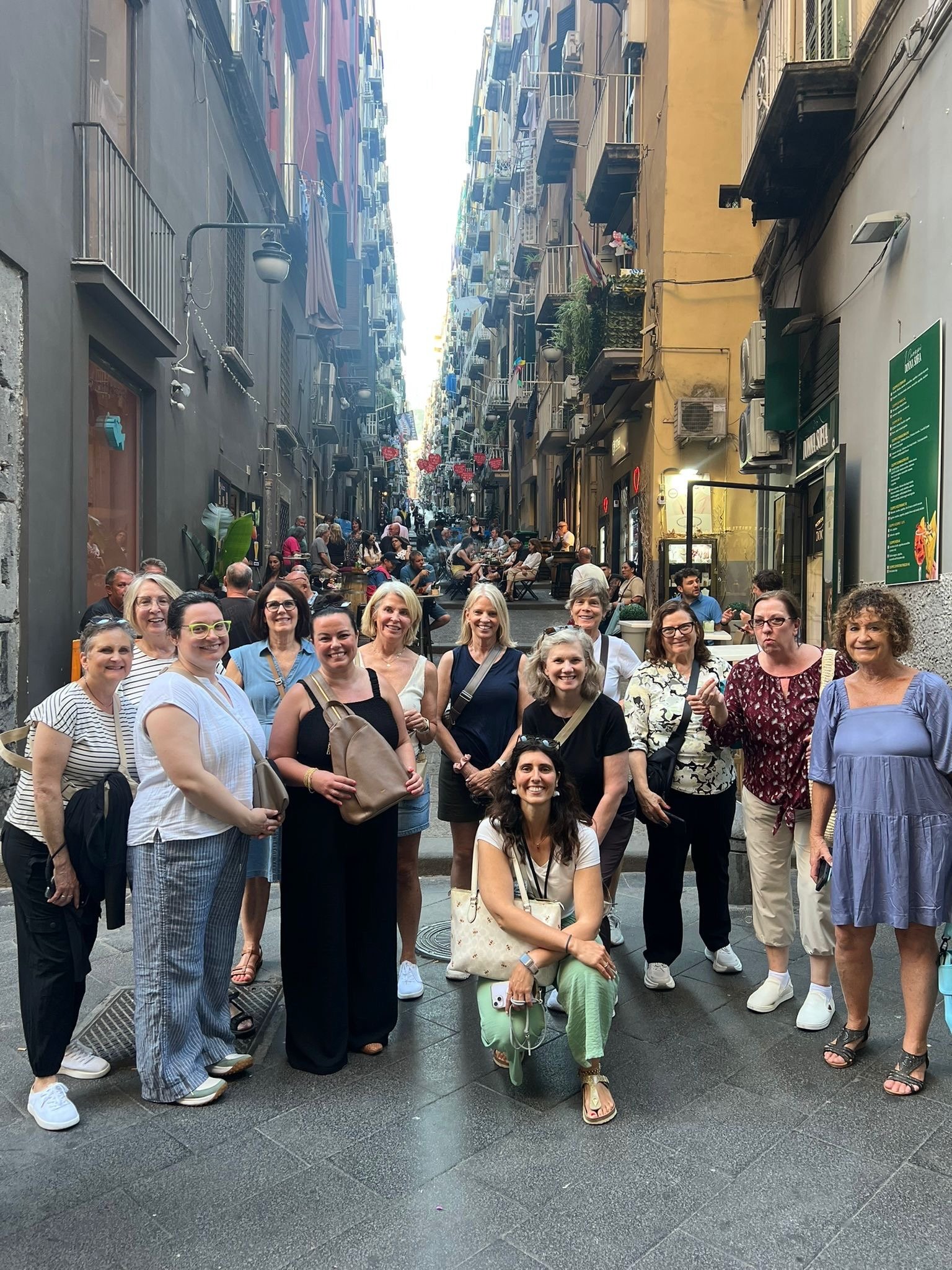 Group of women touring historic Naples, Italy