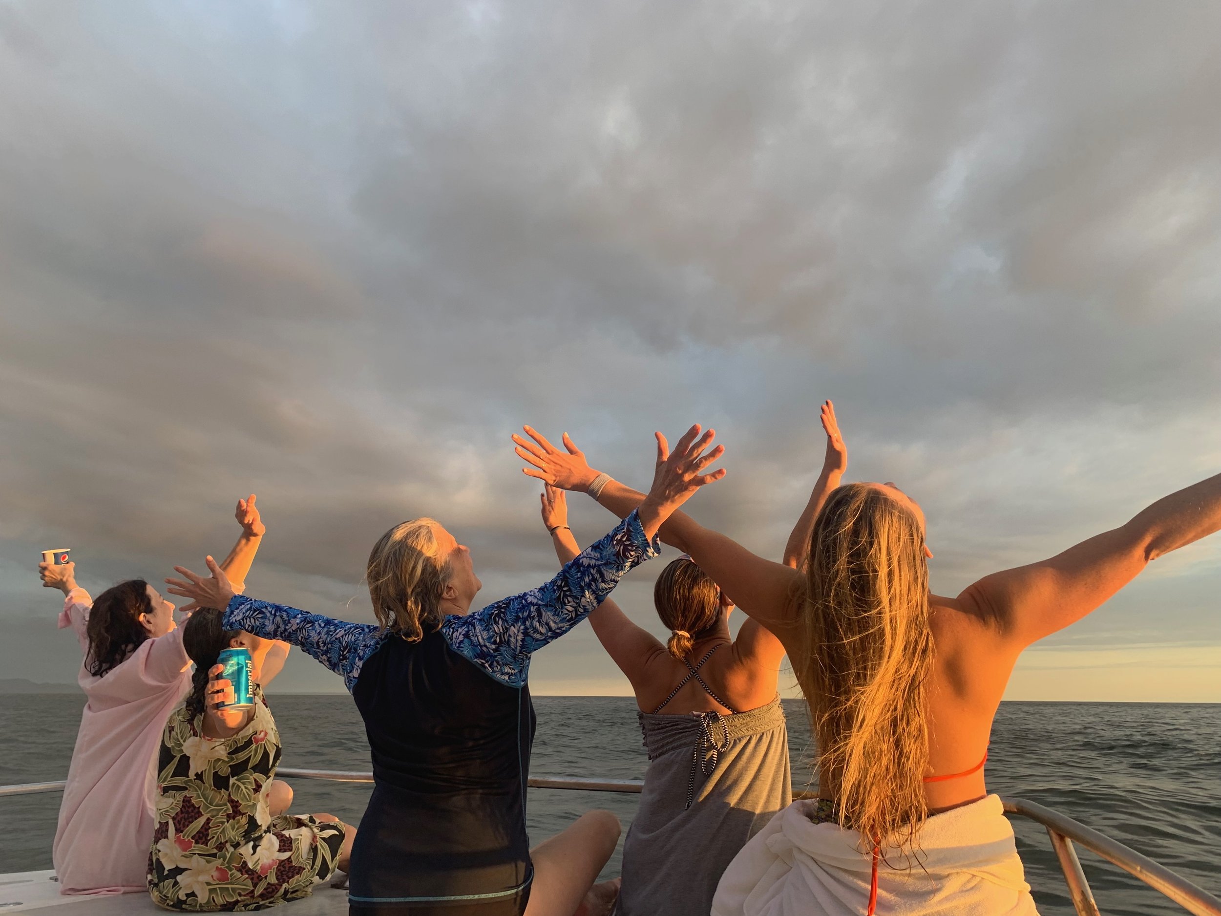 group of women on sunset catamaran ride in Costa Rica