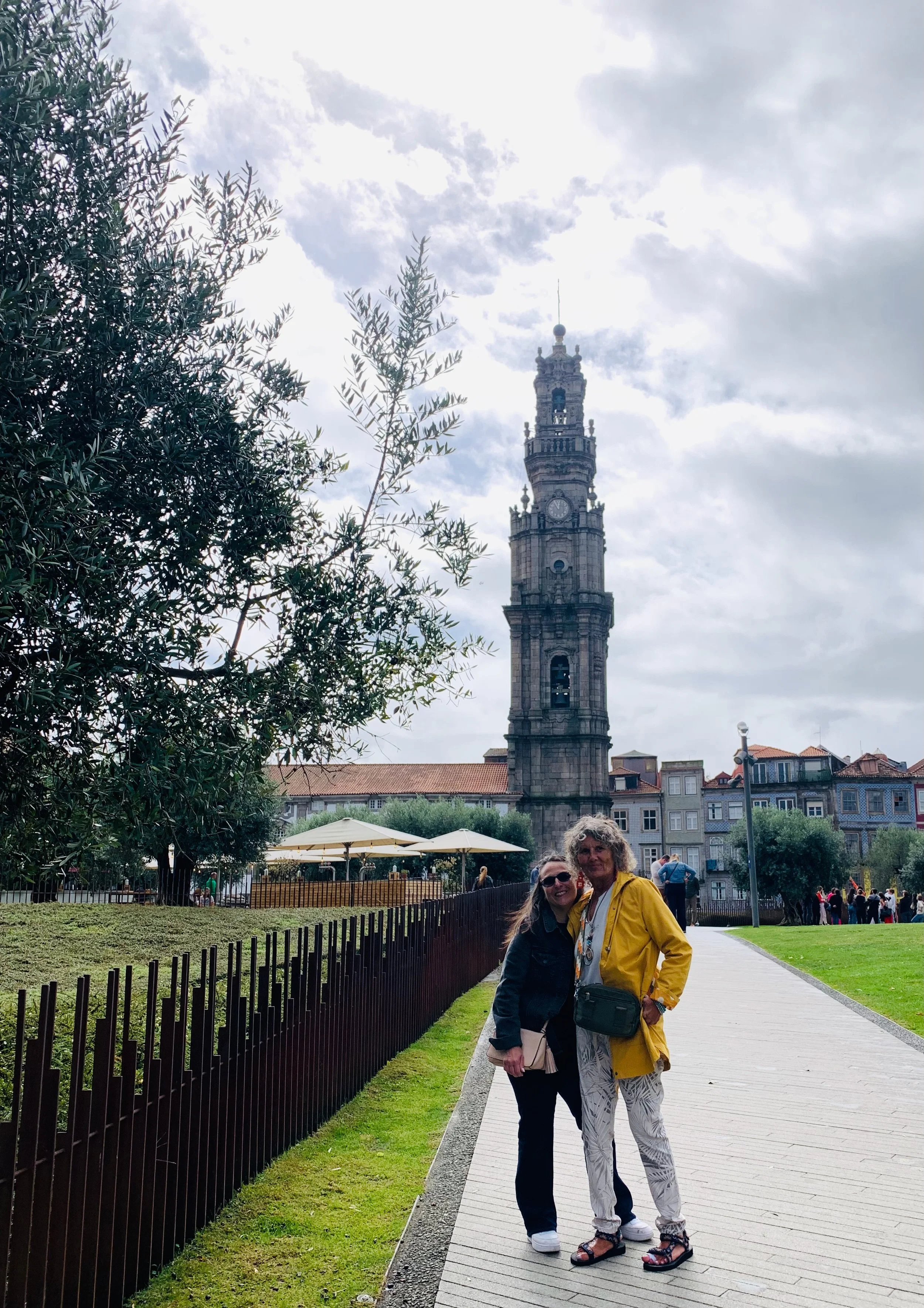 Two women tourists posing on the streets of Porto