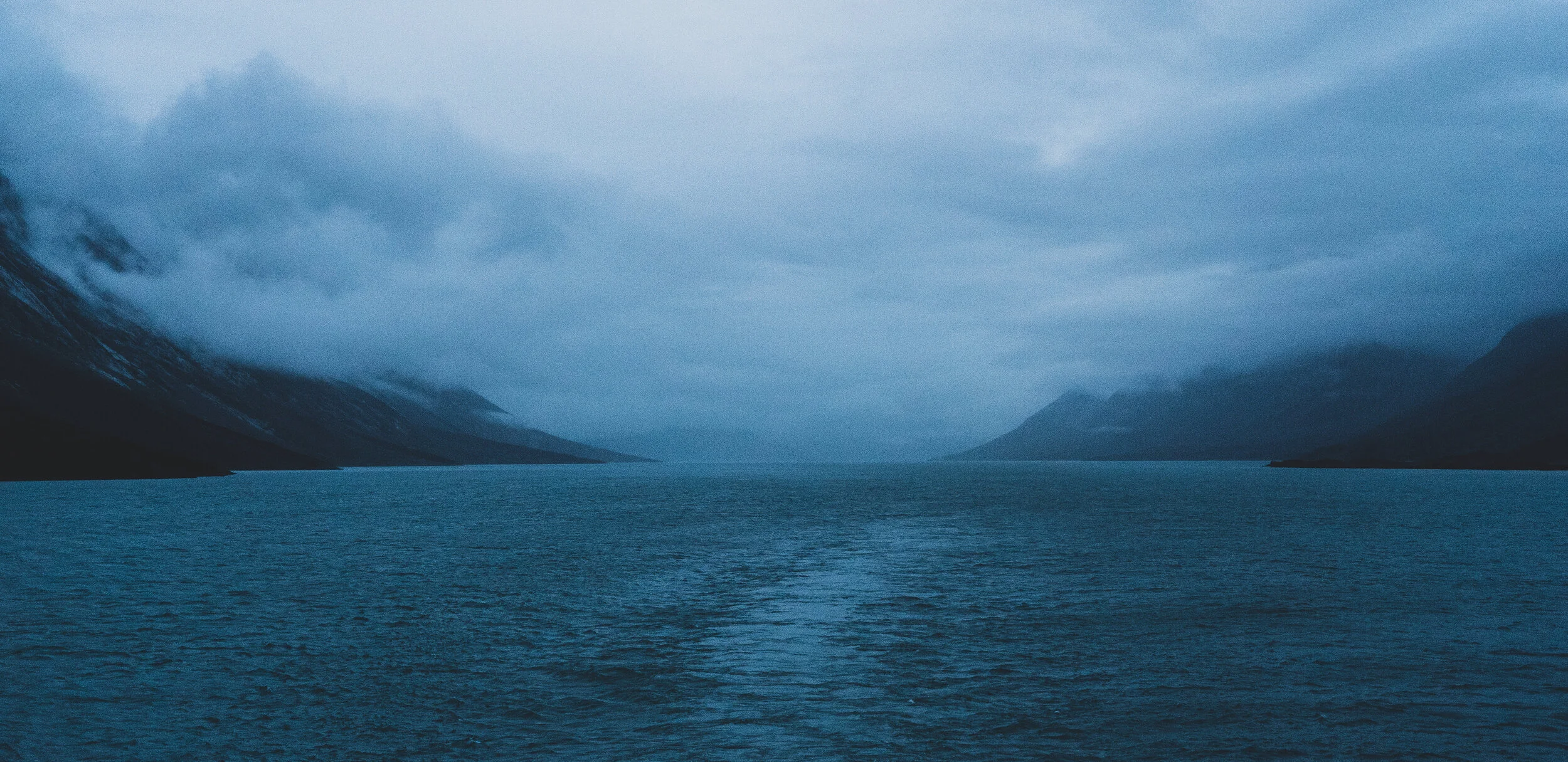 Sailing down the Kangerlussuaq fjord, eerie