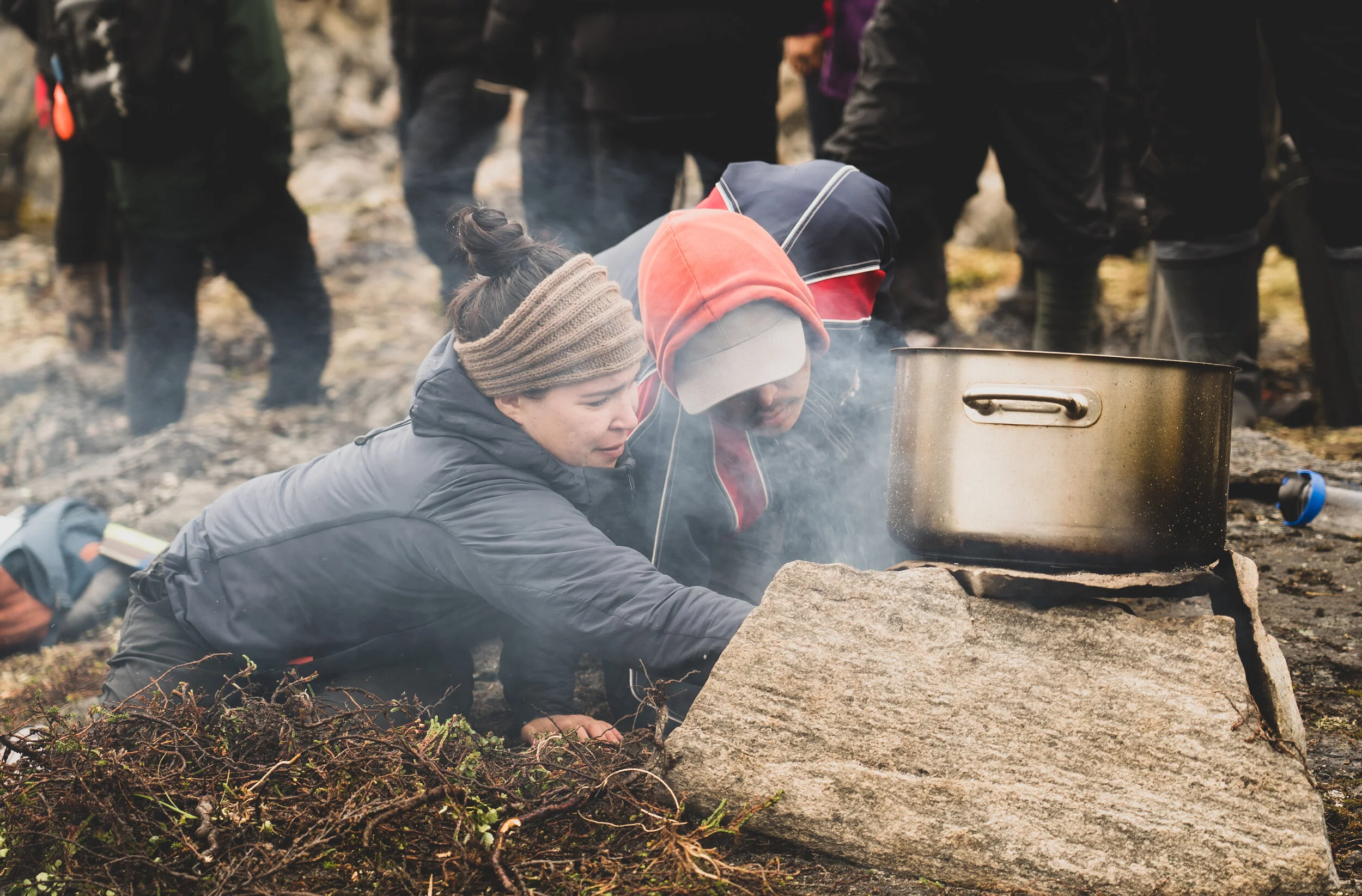 Brewing tea with handpicked plants from the land.