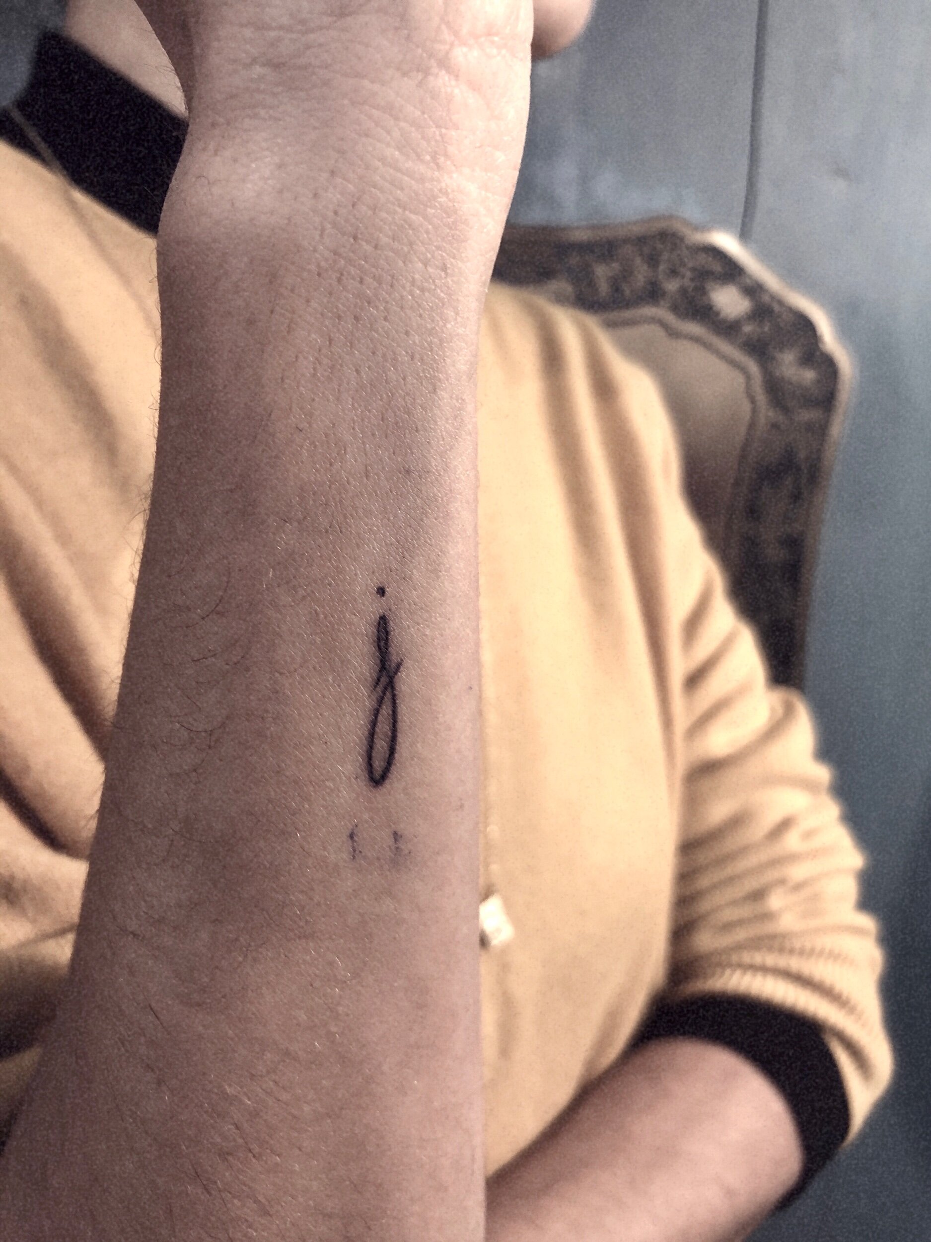 Enchained heart with a j letter tattoo idea | TattoosAI