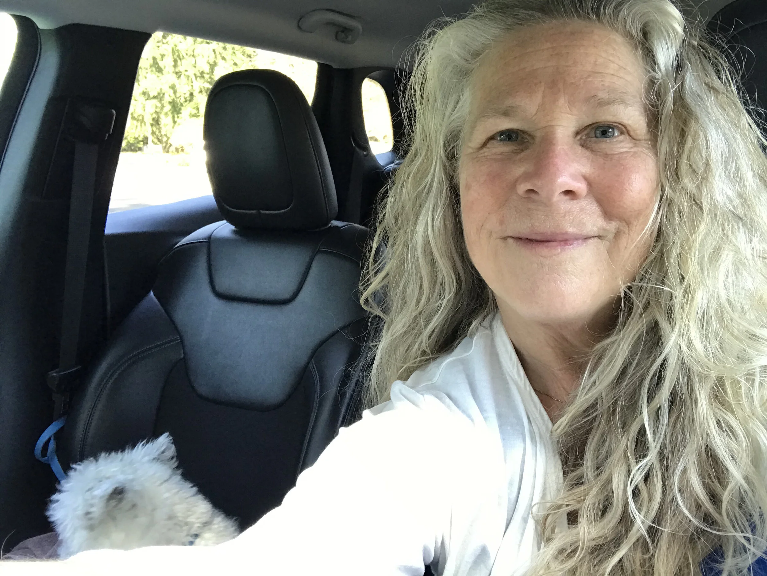 Woman in a rented Red Jeep Cherokee