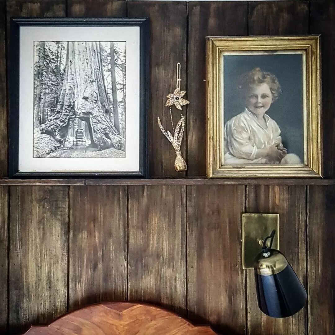 Two sides of the same bed that has been in my family for 100 years. On the shelf above is a faded photo of &quot;our&quot; batman, a print of a drive through redwood that was in my Grandparent's Cornish farmhouse when they bought it at the start of t