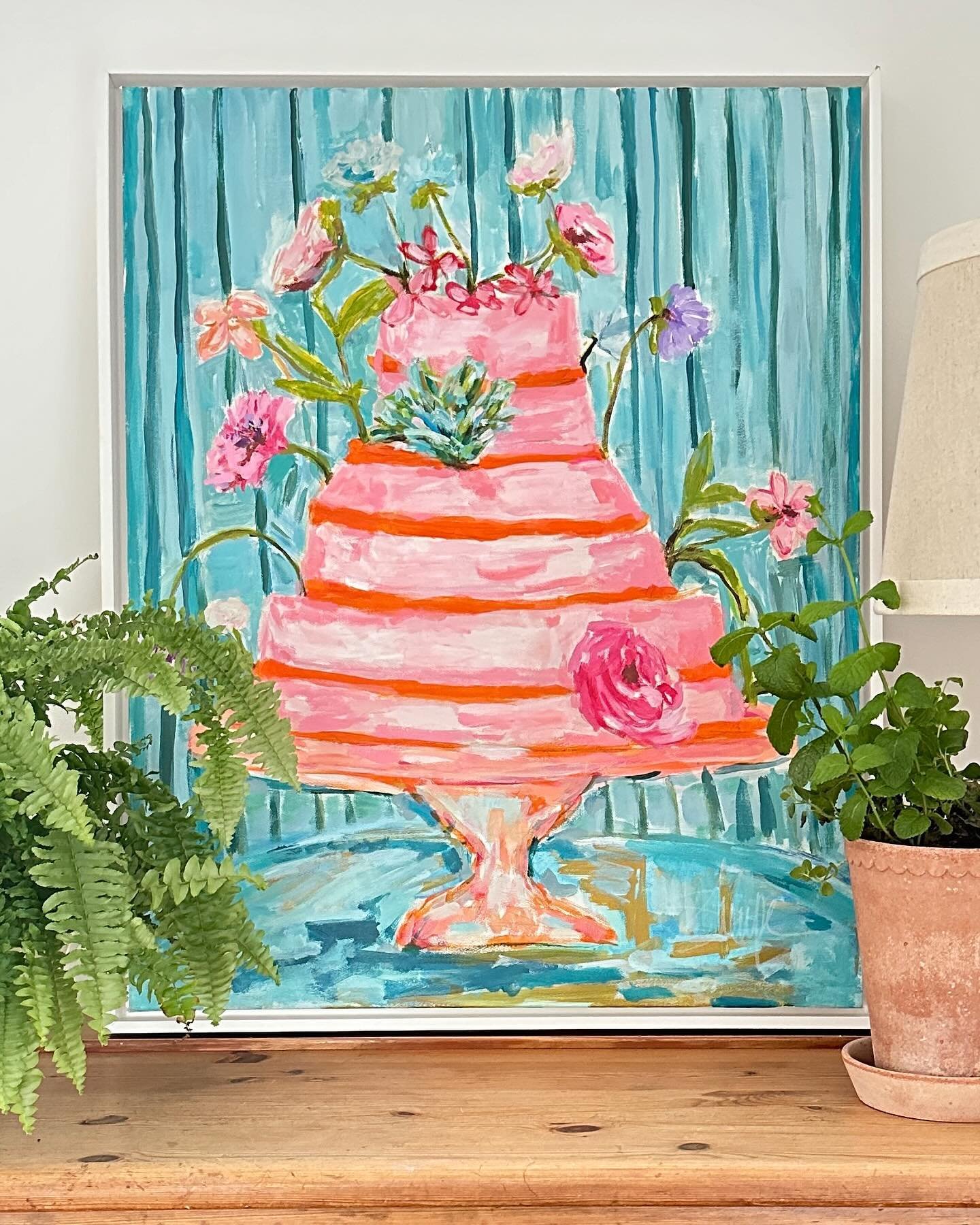 M e e t  M a r i n a 🌸🪸

She&rsquo;s just a pretty pink cake with orange frosting showered in blossoms on a background of lovely sea green /blue wavey stripes. 🌸🪸

I love creating these whimsical  confections and currently having them in my kitch