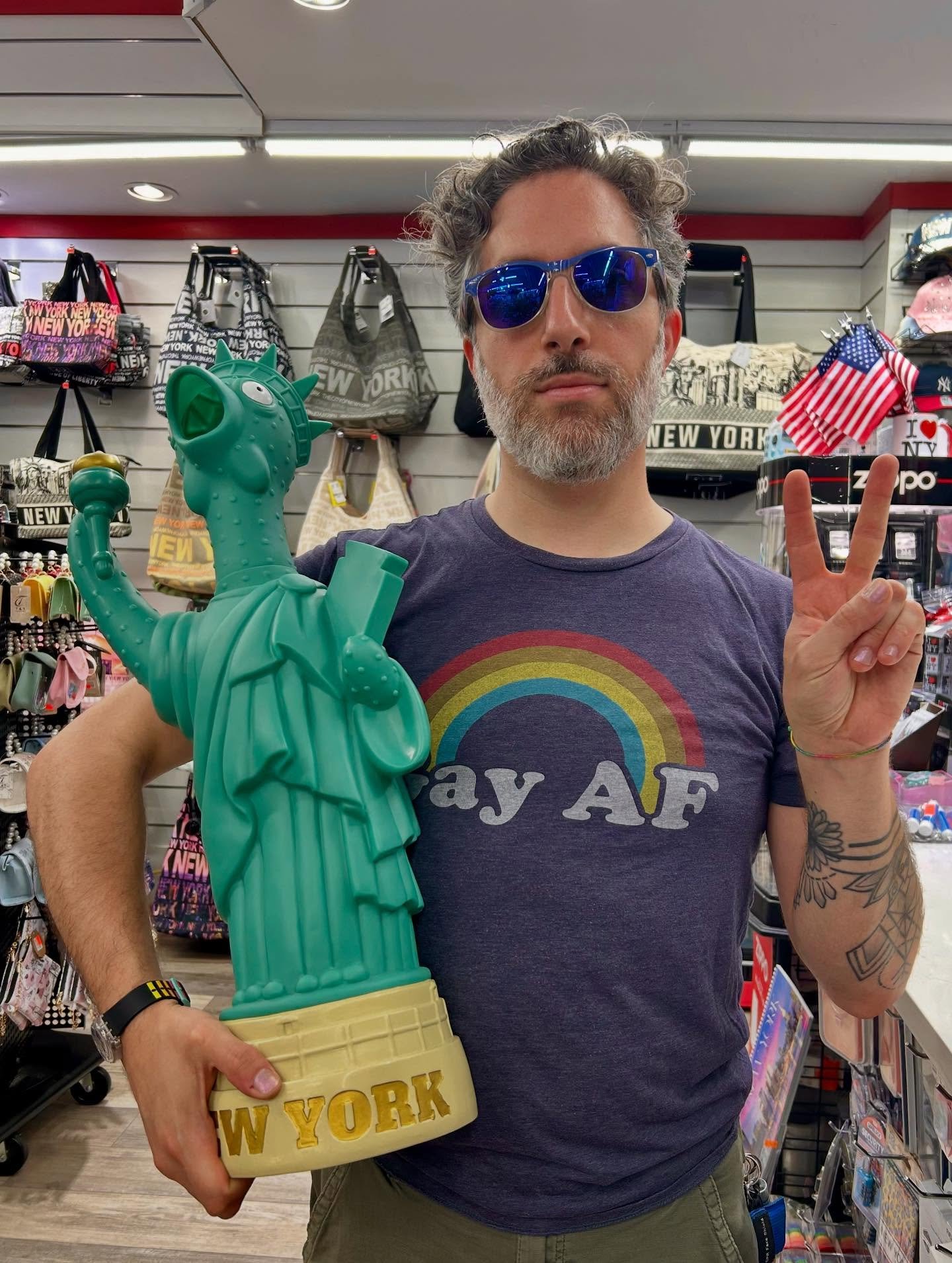 Back in March of 2025, I discovered this gigantic rubber chicken dressed as the Statue of Liberty. When you squeeze it, it makes the most awful noise. The bigger the chicken, the bigger the noise. I already had a small version of the same chicken at 