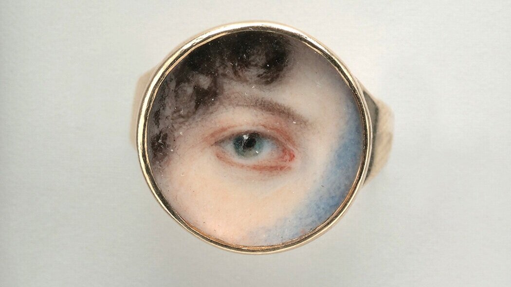 The Little History of Lover’s Eye Jewellery The first known Lover’s Eye jewel is believed to have been exchanged between the Prince of Wales, George IV and his lover Maria Fitzherbet in 1785. George and Maria were ardent lovers, lovers that tried to get engaged and married but were refused by the King. (Although after receiving the jewel, the two did get secretly married!) Nevertheless, this painful and passionate longing was translated with the Lover’s Eye jewel. Once Maria received and displayed herself wearing it, this jewel quickly became commissioned by other love-sick courtiers. To immaculately paint something of that size required significant skill, which is why only the very best miniaturists could perform that task. The most famous portrait miniaturists of that time were Richard Cosway (1742-1821) and George Englehart (1750-1829).