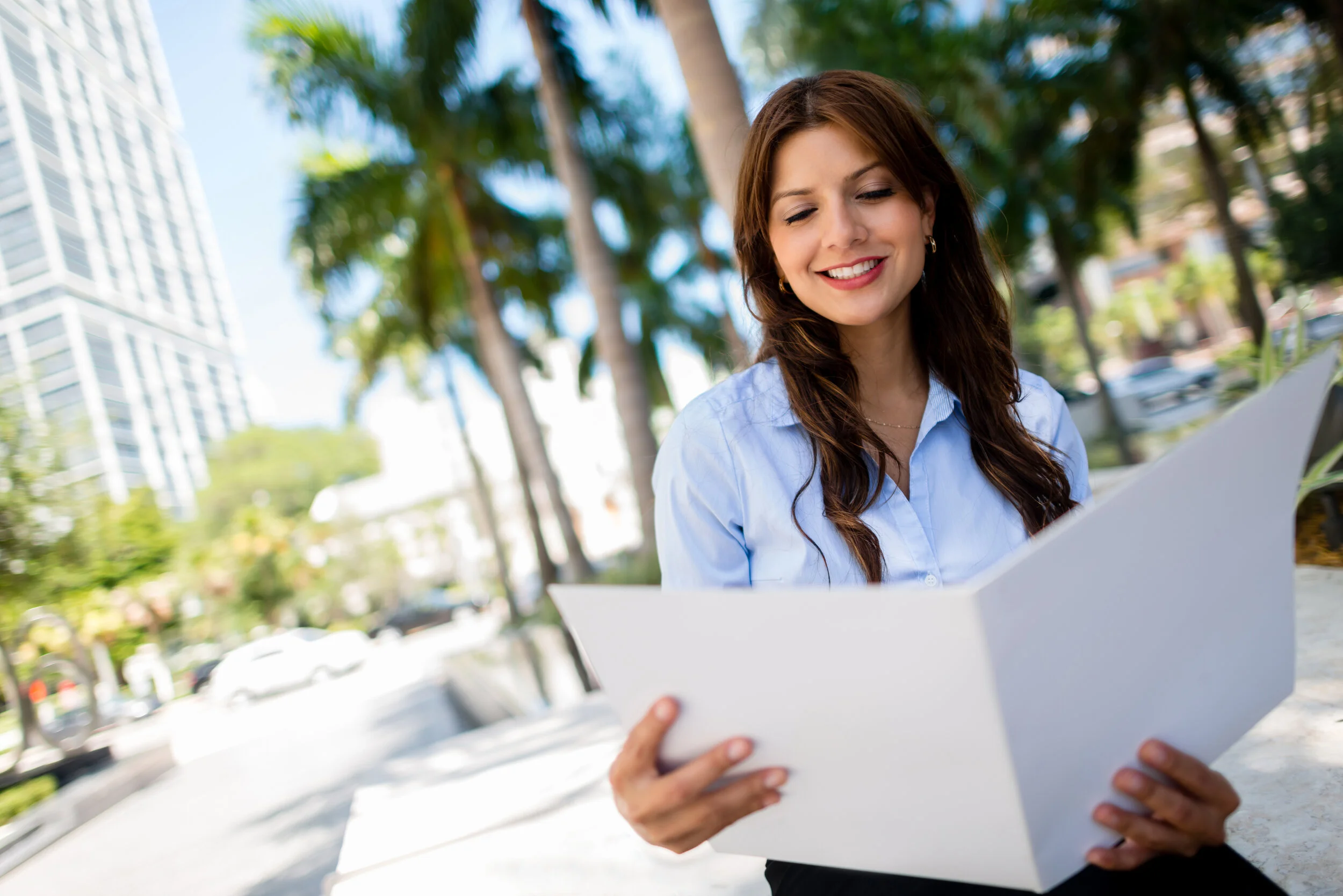 Woman reading brochure