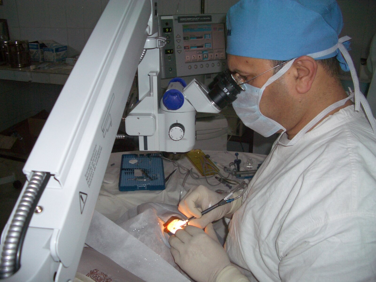 Darkness to Light Dr Alok Sharma operating.JPG