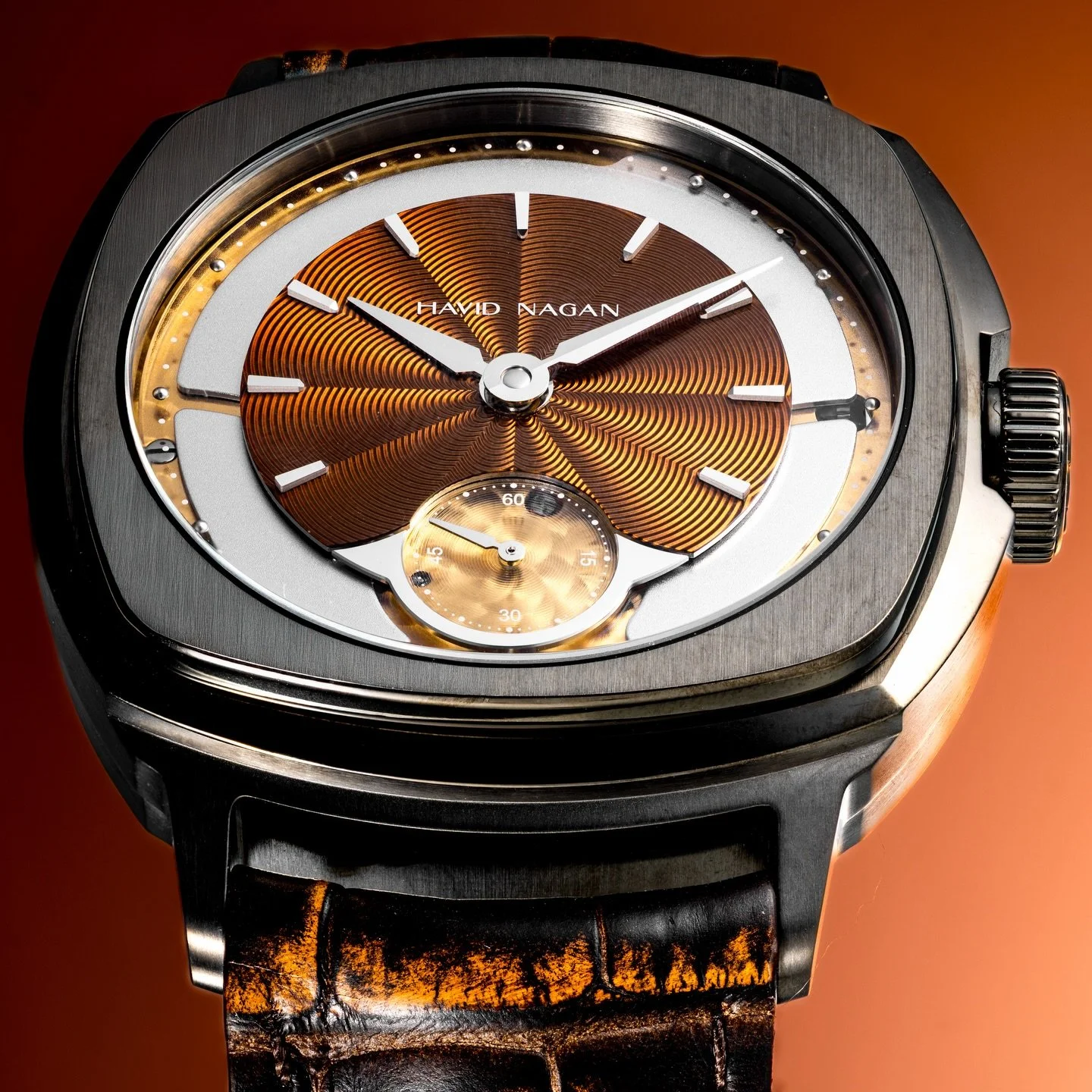 HN02 Ember / I designed the aptly named variant purposefully to slowly reveal itself to the wearer. It feels less like metal and more like a glowing, shifting, mysterious composition that demands to be discovered over time. Not red, not orange, not b