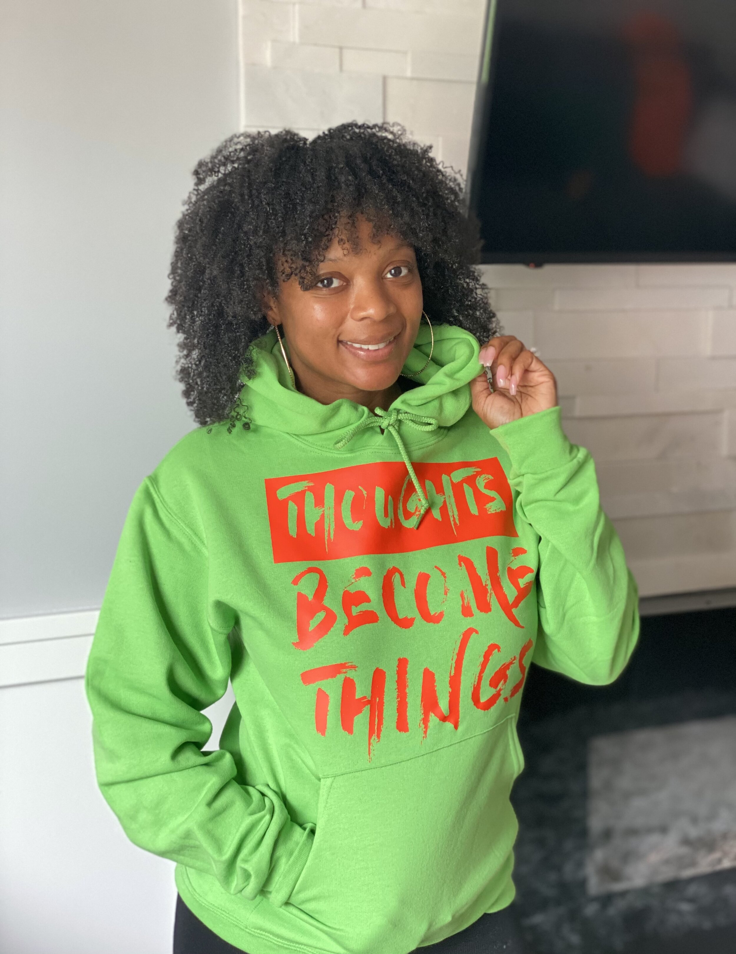 Apple green hoodie with orange ink