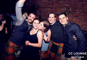 men-in-kilts-with-friends-group-photo-300x209.jpg