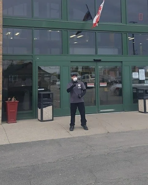 Security guard monitoring construction site in Rockton Ontario protecting equipment and materials