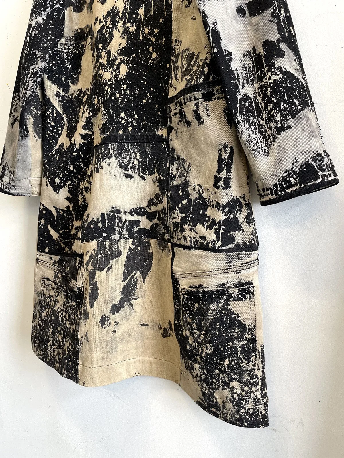 11.24.25 bleach trench bk close up.jpg