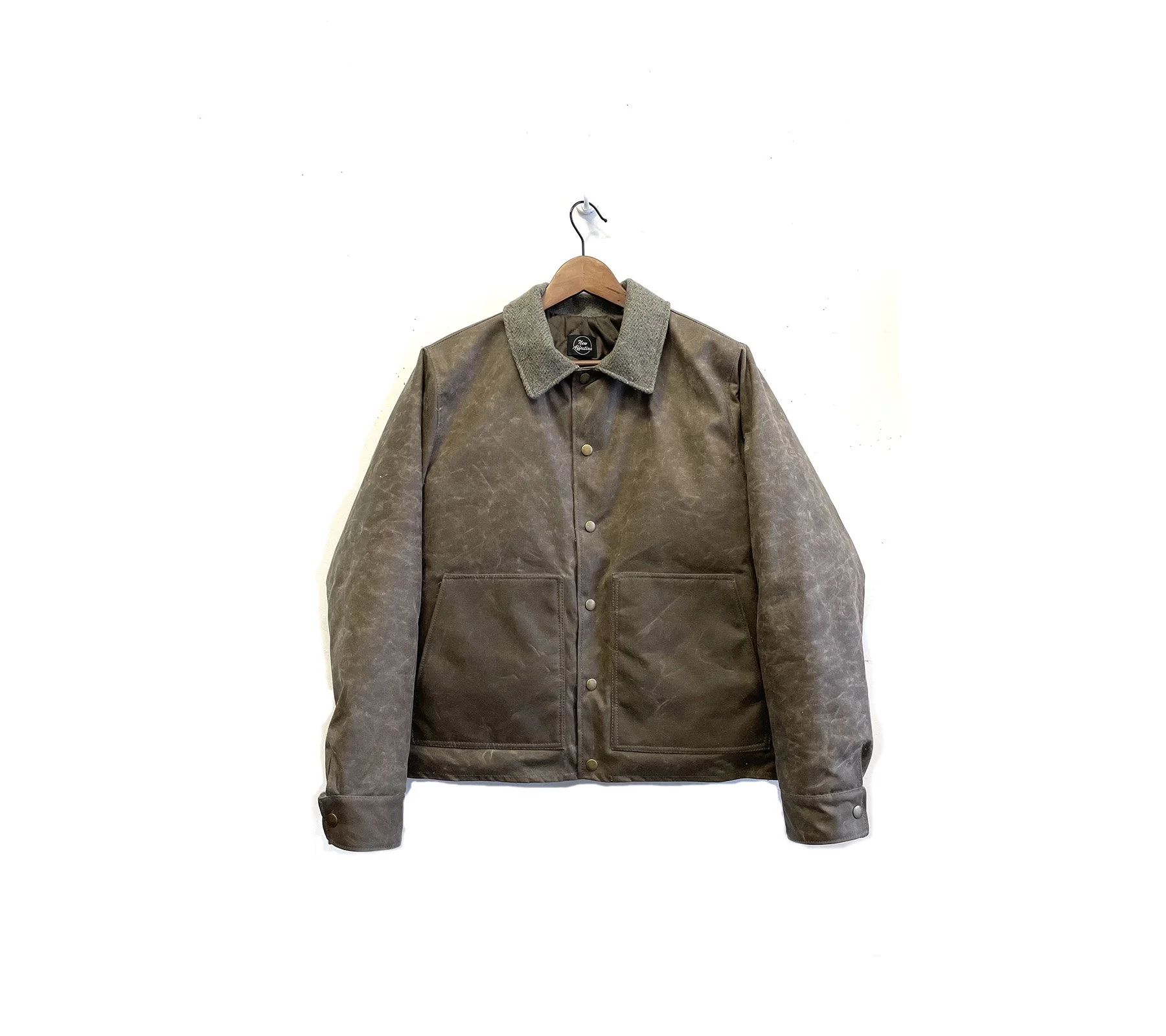 11.20.25 waxed canvas quilted frt.jpg
