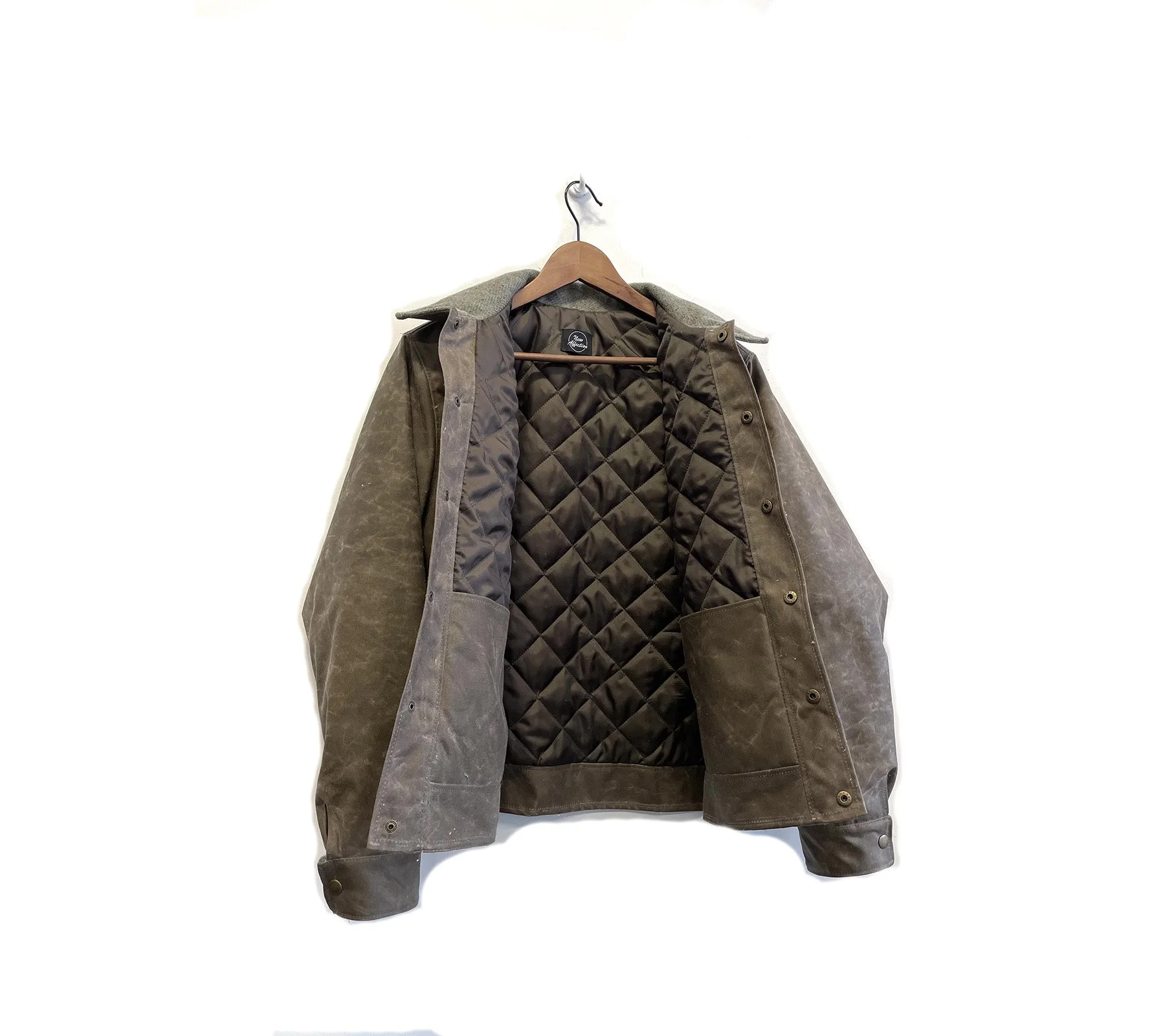 11.20.25 waxed canvas quilted- interior.jpg