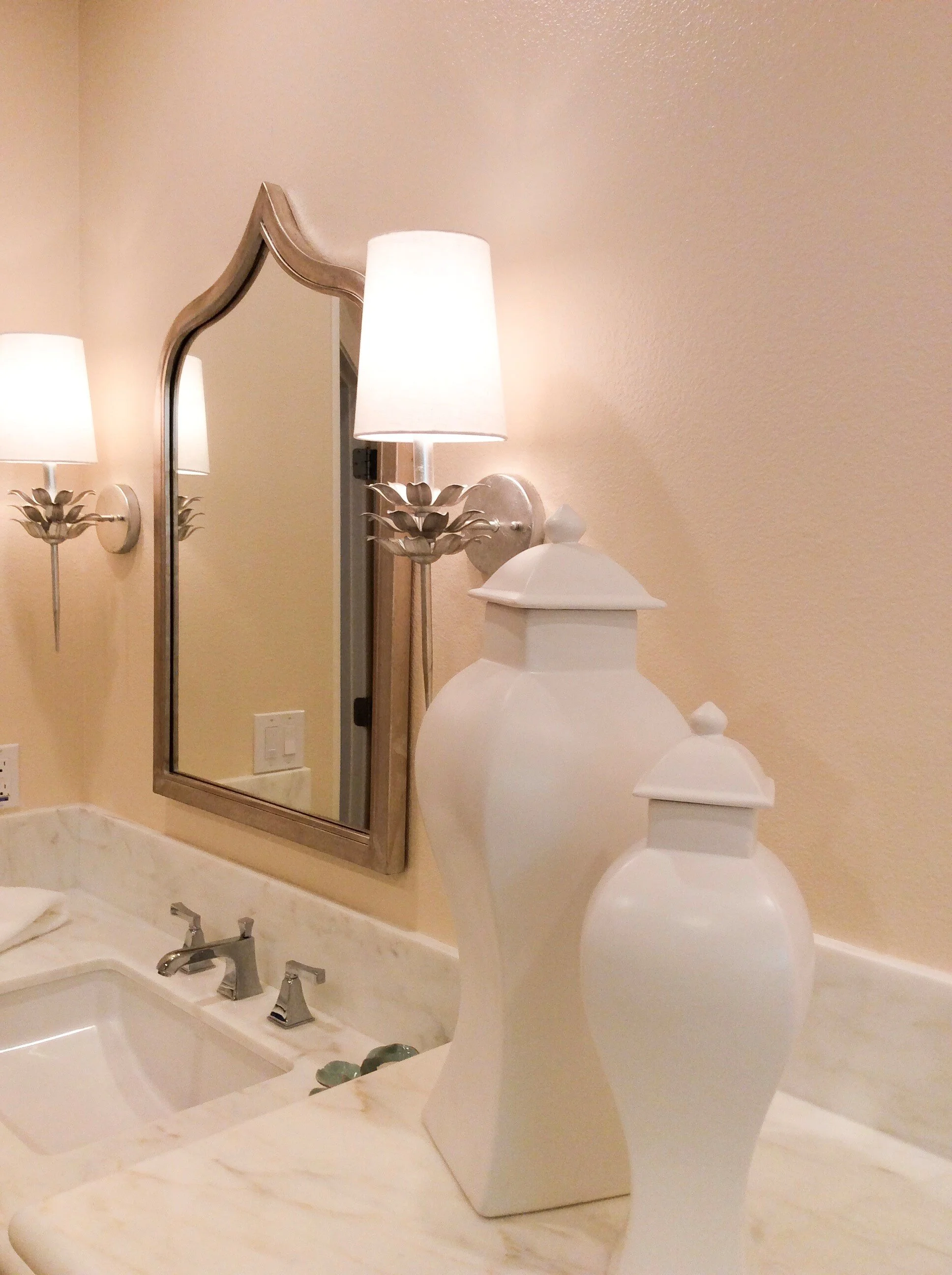  Counters and shower bench in custom marble, shower surround featuring a mix of limestone and custom marble mosaic work.  