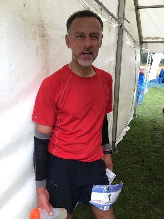Paul after crossing the finish line. Credit: www.fionaoutdoors.co.uk
