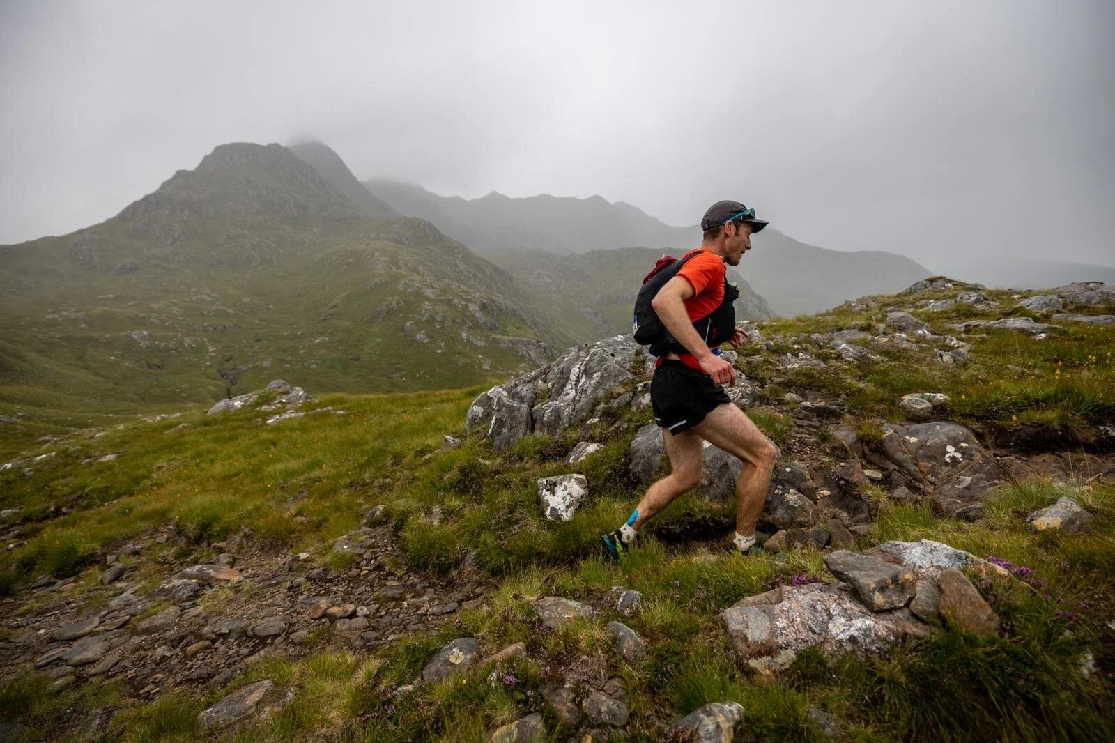First placed Ian Stewart makes running on the rugged paths look easy. © No Limits Photography