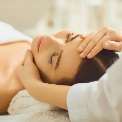 Relaxing spa ritual combining massage and facial treatment at LutZen Massage Studios in Grand Marais and Lutsen Minnesota