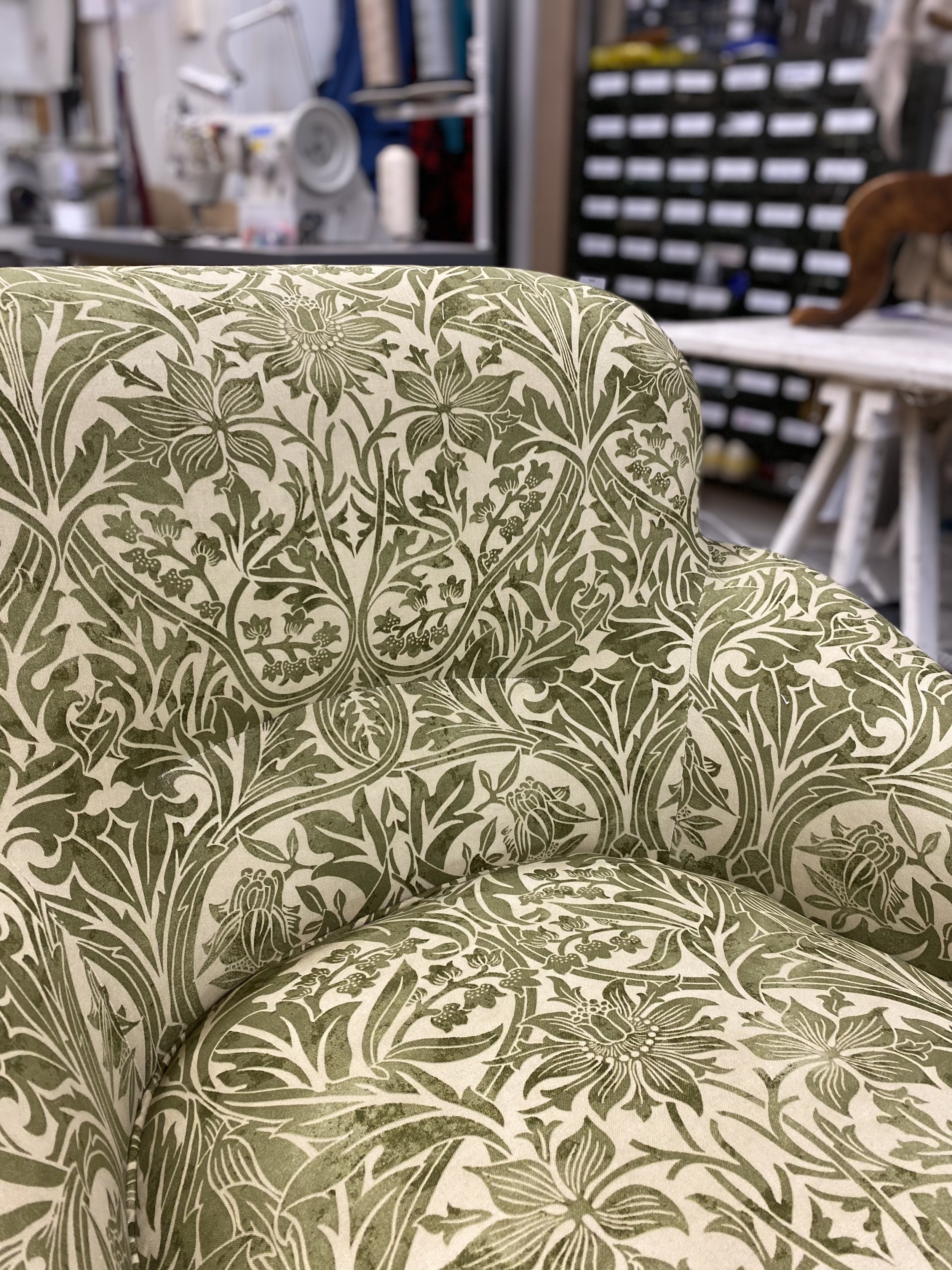 Traditionally reupholstered armchair in William Morris print fabric