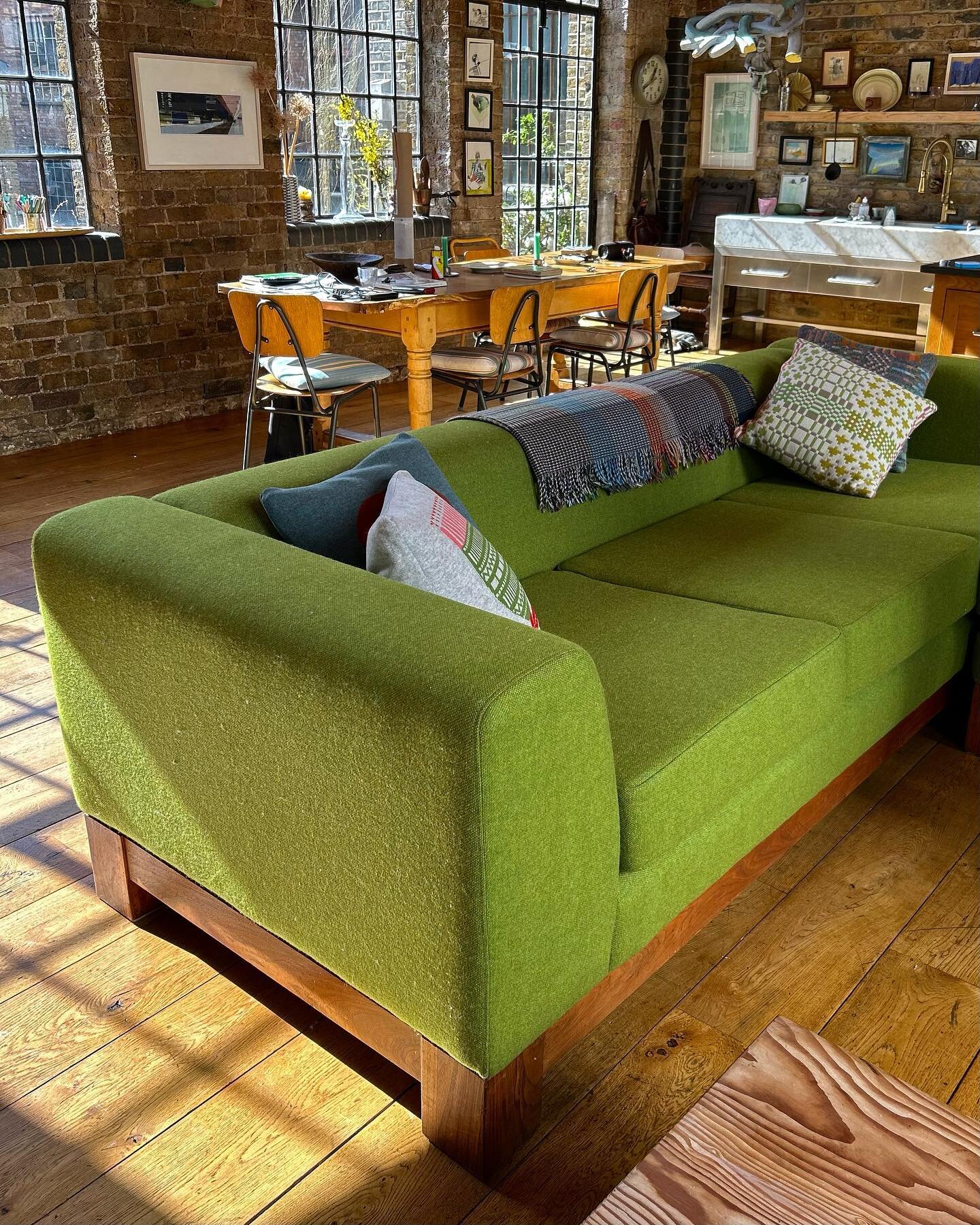 This sofa has always been the centrepiece of this amazing space at Faith House, Shoreditch. The colour was already ideal, but the old fabric was a bit worn out and there were a few layers of fabric beneath, slightly concealing the shape. We took it a