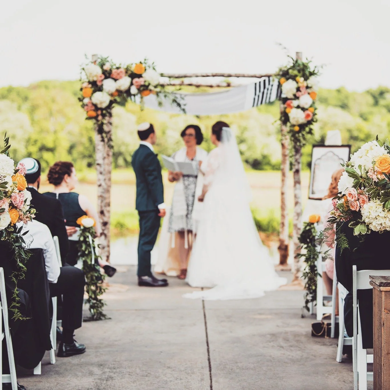 Loved this outdoor ceremony in the Virginia Countryside. This adorable couple got the perfect day to get married. A historic farm was the backdrop for this beautiful ceremony. 

Enjoy the delicious celebration pics of them going up for the Hora, gazi