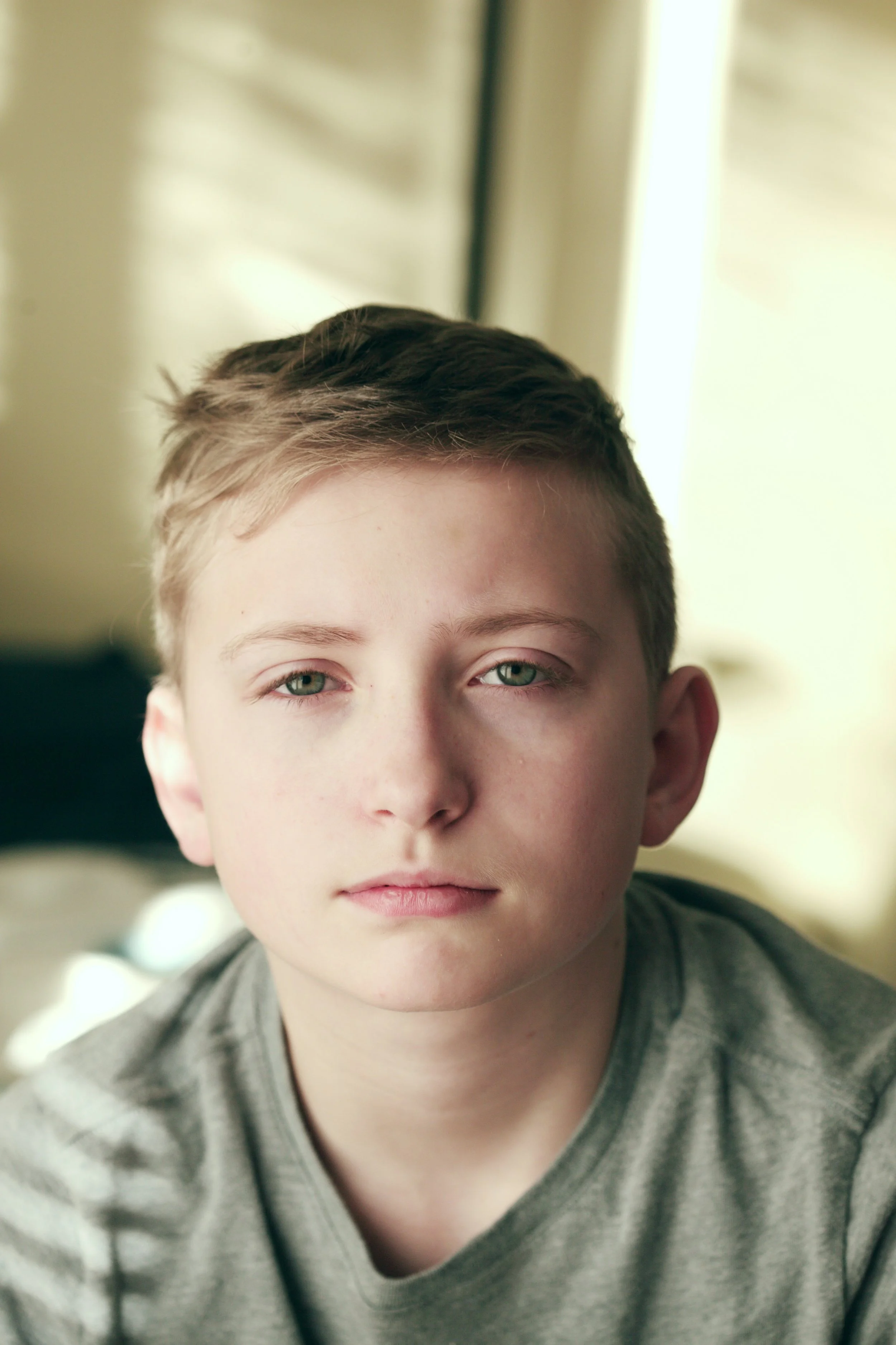 child with childhood apraxia of speech CAS in online therapy session Texas