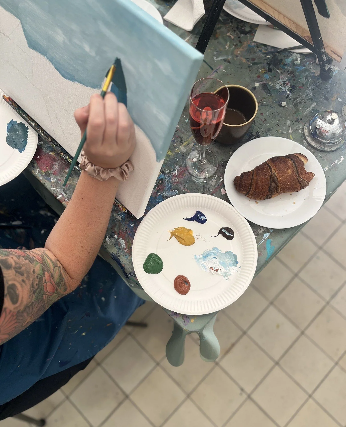 All components of a palette - coffee, croissant, bubbles, and paint...what else do you need?⁠
⁠
#sipandcreatemalmo #paintingevent #artnight #sipandcreate #painting #sipandpaint #malmoart #artinmalmo #kickoff #teambuilding #paintparty #paintingparty #