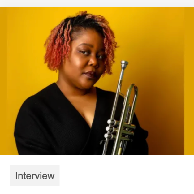 Photo cover page of article. Theresa is holding a her trumpet