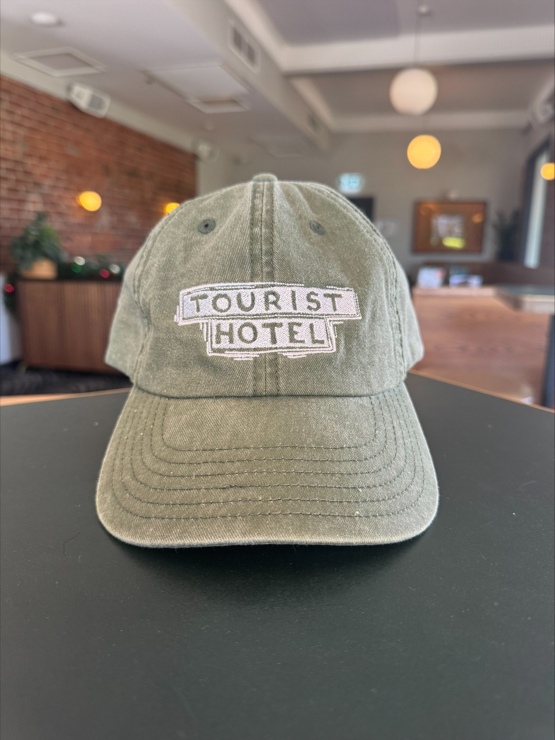 Green hat white embroidered.jpeg