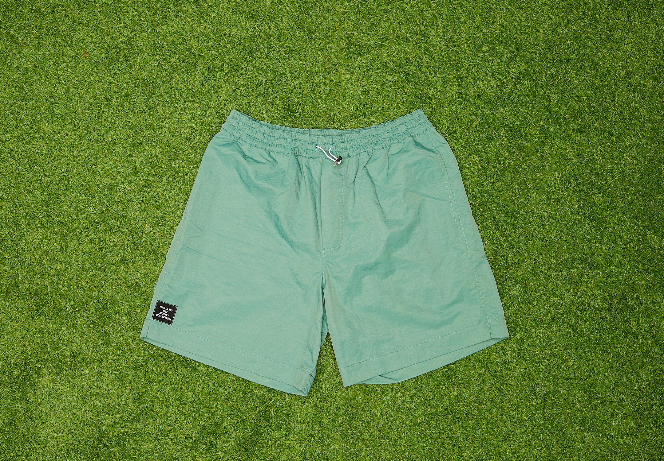 MONEY SHORTS CORAL GRN UNISEX