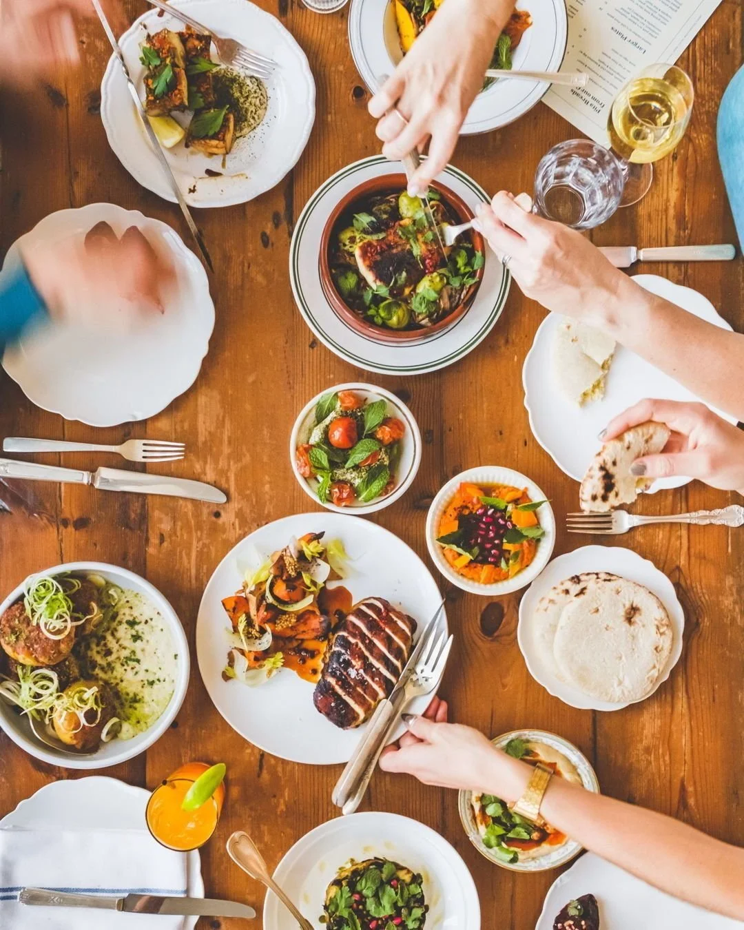 Did you know we take reservations on a limited basis for groups of 6-10? We invite these groups to join in on our &quot;family feast&quot; menu which consists of pita &amp; spreads, small plates, large plates &amp; desserts that are sent our from the