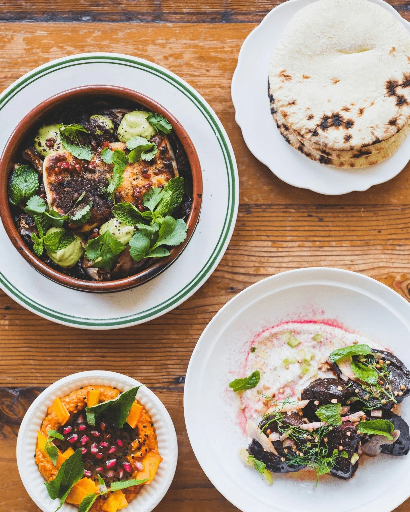A perfect spread if you ask us ✨ 

🌰 squash, green chili &amp; hazelnut dip w/ pomegranate &amp; nigella
🥬 wood roasted halloumi w/ caramelized cabbage, barberries, green tahini &amp; anchovy
🧄 grilled beets w/ black garlic, pickled celery, almond