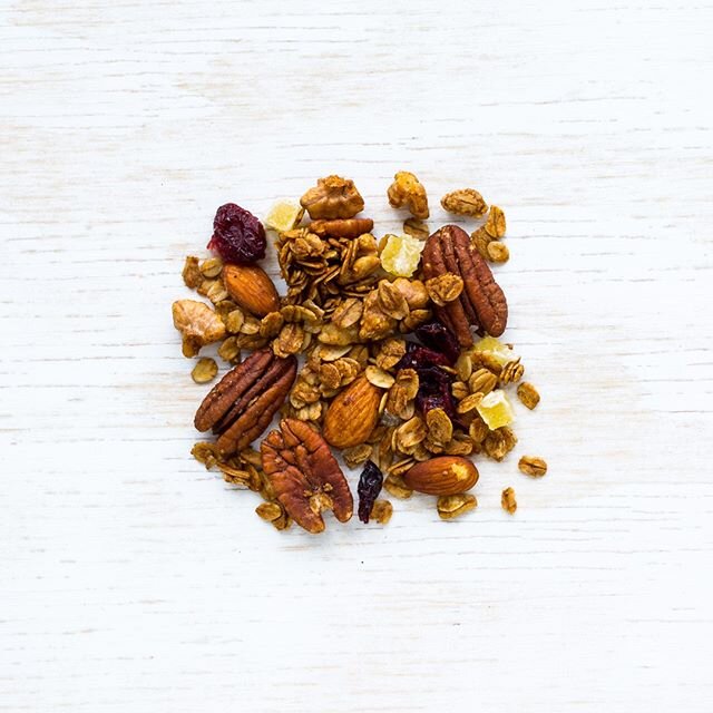 This is gingerbread granola and it's got lots of sweet holiday spices, molasses, pecans, dried cranberries, and crystallized ginger. This granola is FULL of holiday cheer and makes an easy homemade gift that everybody will appreciate receiving. I dar