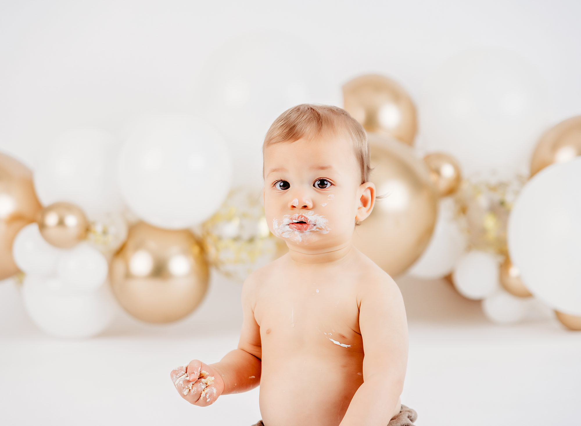 1 year birthday portrait, little boy, balloons, cake smash