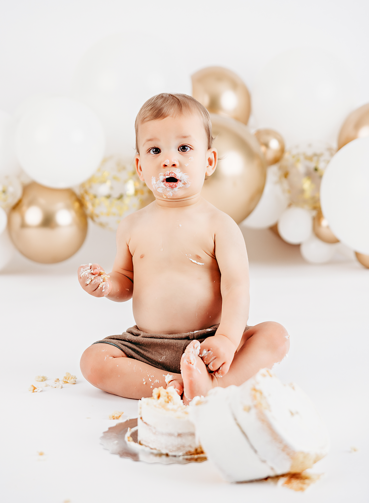 1 year birthday portrait, little boy, balloons, cake smash