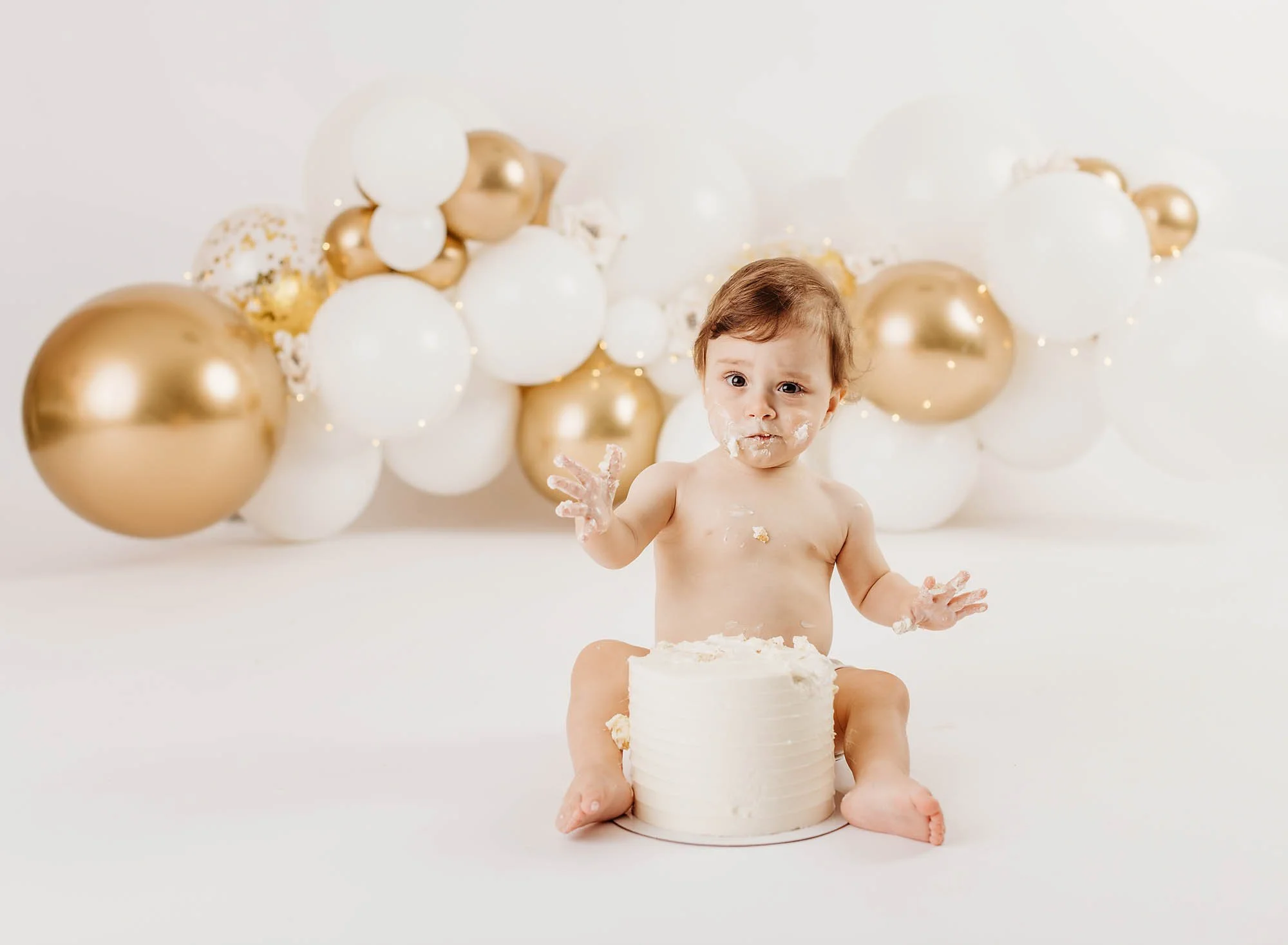 1 year birthday portrait, little girl, balloons, cake smash