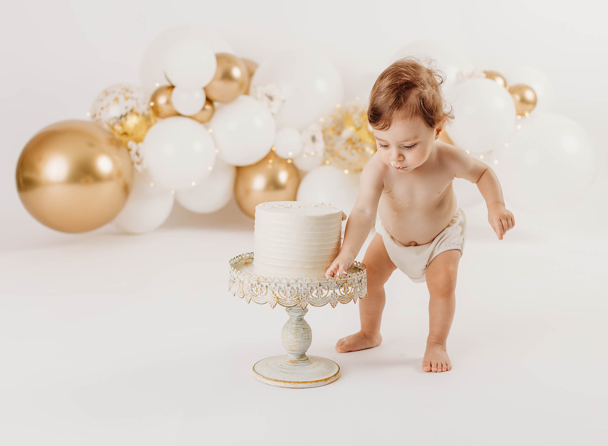 1 year birthday portrait, little girl, balloons, cake smash