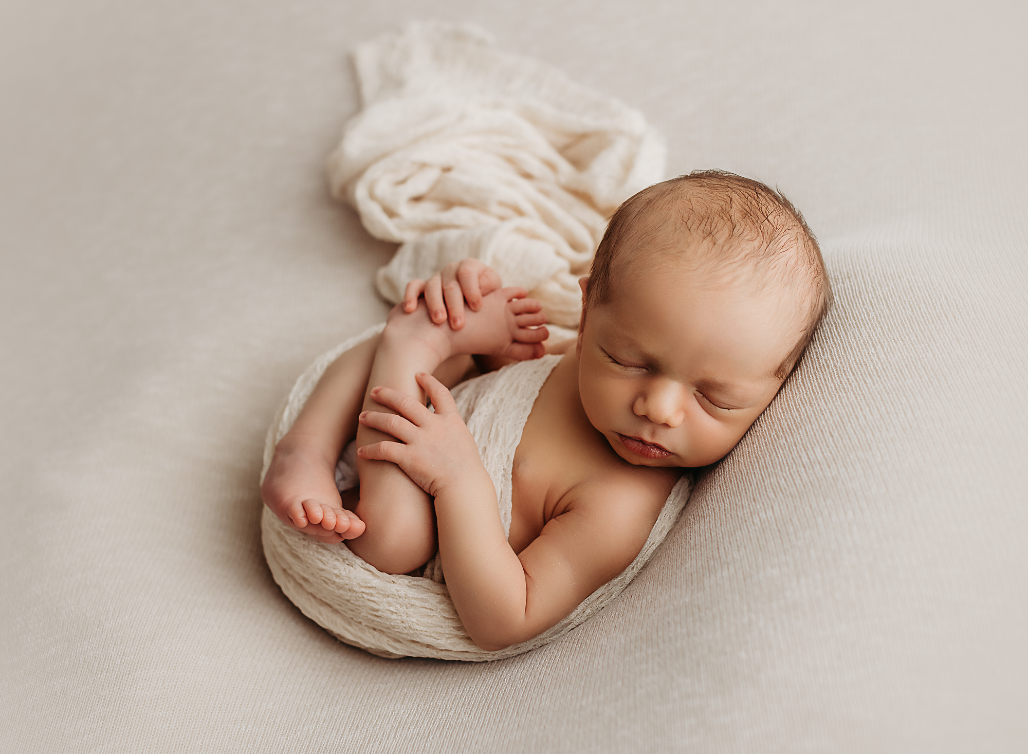 Newborn, baby in a wrap, newborn photo shoot